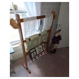 Quilt rack, quilts, runners and doillies