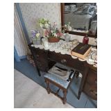 Mahogany desk and stool, framed mirror, bible, floral arrangements, purse