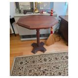 Vintage octagon side table, broom, antique rug
