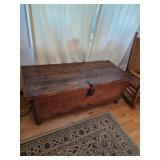 Antique rustic wooden trunk, Antique rug