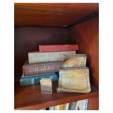 War and Peace, brass bookends, brass match box
