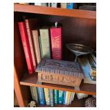 Peruvian carved wooden boxes, silver candy dish, books