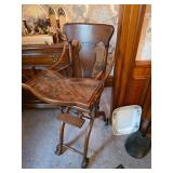 Vintage wooden highchair with cane seat