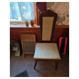 Washboard, snow brush, chair, candle