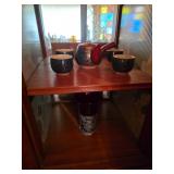 Japanese Kutani porcelain tea set featuring a dark blue glazed finish with gold and red floral detai