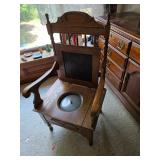 Antique wooden commode armchair