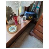 Commemorative plate with gold trim, bid vases, cooler