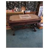 French Louis XIII style writing table crafted from solid oak.The desk features a rope-carved edge de