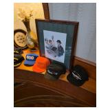 Framed artwork, assorted baseball hats