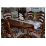 Ethan Allen Dining Room Table with beautiful embroidered seats