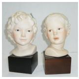 signed busts, pair