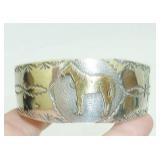 Sterling heart motif cuff