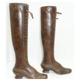 bronze metal boots