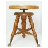 antique piano seat, adj