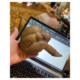 weeping man wooden figurine