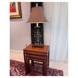 The nesting table have been sold. The lamp is available.
