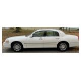 Country Squire home auction including 2003 Lincoln Towne Car Executive