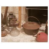 Antique lanterns, oil lamps, cast iron pots, etc....