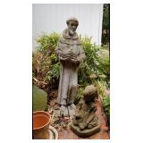 Many outdoor sculptures, pots, and other decor