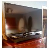 Several large flat screen TV