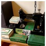 Singer Featherweight sewing machine with original case,  several accessories, original book, etc...
