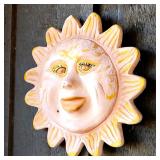 Several terracotta outdoor wall decor pieces (Sun)