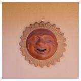 Several terracotta outdoor wall decor pieces (Sun)