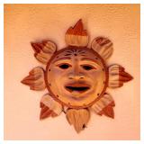 Several terracotta outdoor wall decor pieces (Sun)