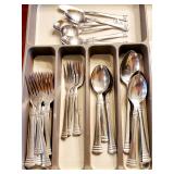 Several flatware sets