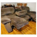 Double recline microfiber sofa with media center middle section.