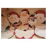 Assorted Christmas plates and tableware