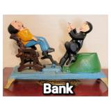 Antique "shoe shiner" coin bank