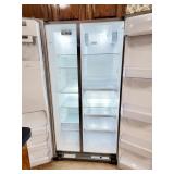 STAINLESS Whirlpool side by side refrigerator
