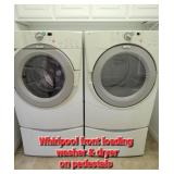 Whirlpool front loading washer & dryer on pedestals