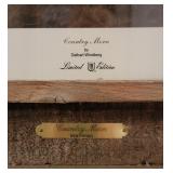 Several pieces of framed Windberg art