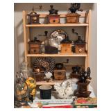 large collection of vintage coffee grinders