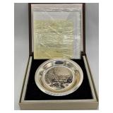 A 6.10 ounce solid sterling silver plate produced by the Franklin Mint of the "Brandywine Battlefield" created by James Wyeth. All paperwork and COA with the original box is included.