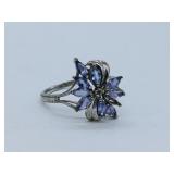 A Sunburst Tanzanite size 8 ring marked