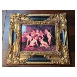 A framed Italian Renaissance style cherub print with an ornate gilt and black frame and a Giorgione signature visible in the image area with a handwritten size note reading 16 x 14, circa 60s.