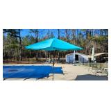 Blue outdoor umbrella with solar charging capabilities