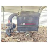 Agri-Fab lawn vacuum with Briggs & Stratton engine, per seller item is in working condition