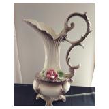Capodimonte style Italian ceramic cornucopia vase with an applied pink rose, scroll handle, and pede