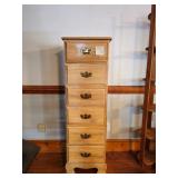 Wooden chest of six drawers with brass handles; measures 54.5" 17.5" 13.5"