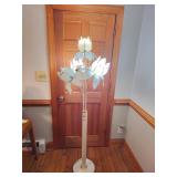 Mid century style floral floor lamp with white petal form frosted glass shades, gilt tone trim, and 