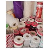 Group of assorted decorative mesh ribbons in various colors and patterns
