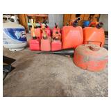 Group of gasoline cans including a vintage all-purpose gasoline can.