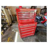 Craftsman red metal tool chest with multiple drawers containing assorted tools and sockets; measures