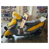 Yellow and gray Manco Hornet 50 motor scooter with black seat, mirrors, front headlamp, and side Hor