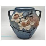 Roseville U.S.A. Magnolia handled vase with blue textured body, raised cream and brown magnolia flow
