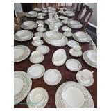 Noritake Ivory China Miyoshi pattern dinnerware set with floral and gold trim